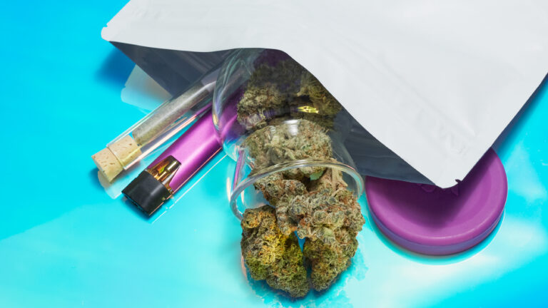 Various cannabis products in white bag