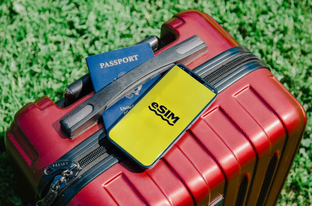 Preparing a smartphone and travel essentials before using streaming services abroad.